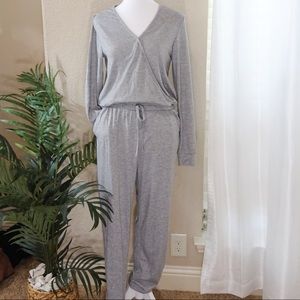 Faux wrap long sleeve jumpsuit